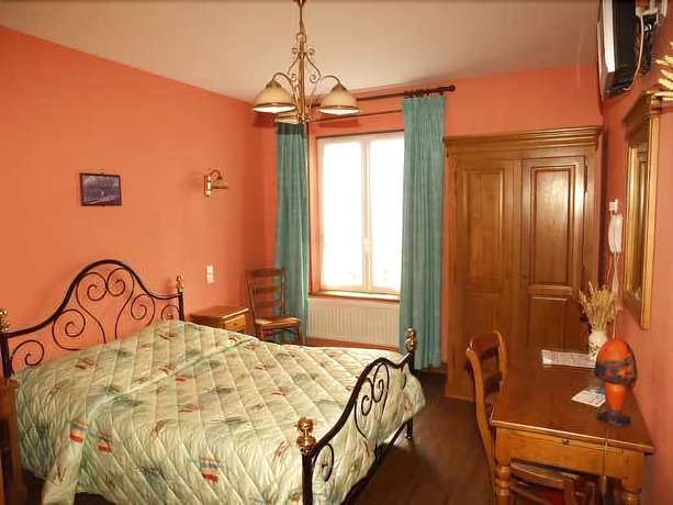 Imagen de la habitación del Hotel De Calais. Foto 11