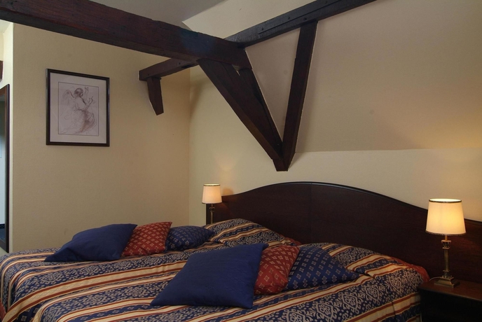 Imagen de la habitación del Hotel De Castillion. Foto 4