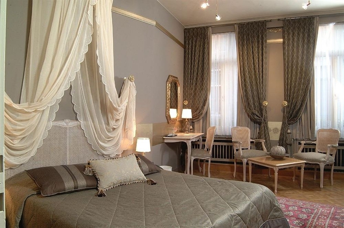 Imagen de la habitación del Hotel De Castillion. Foto 7