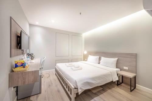Imagen de la habitación del Hotel De Centro Bangkok Hotel. Foto 10