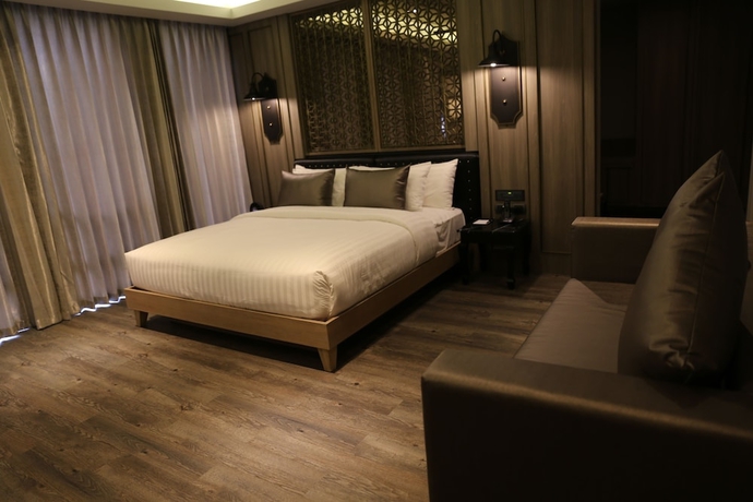 Imagen de la habitación del Hotel De Chai the Deco Chiang Mai. Foto 5