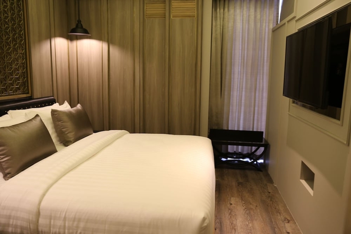 Imagen de la habitación del Hotel De Chai the Deco Chiang Mai. Foto 9