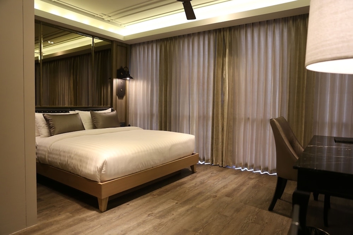 Imagen de la habitación del Hotel De Chai the Deco Chiang Mai. Foto 11