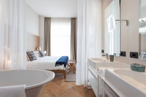 Imagen de la habitación del Hotel De Charme Laveno. Foto 8