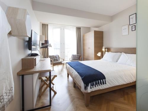 Imagen de la habitación del Hotel De Charme Laveno. Foto 9