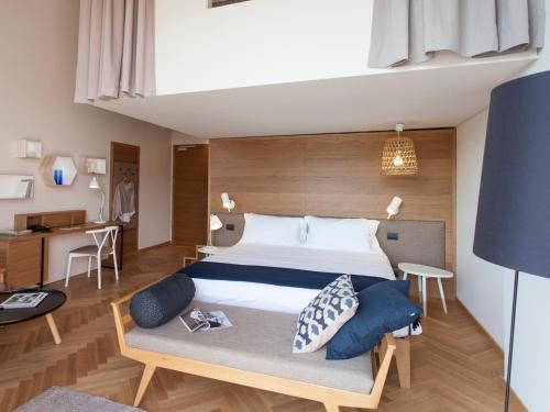Imagen de la habitación del Hotel De Charme Laveno. Foto 10