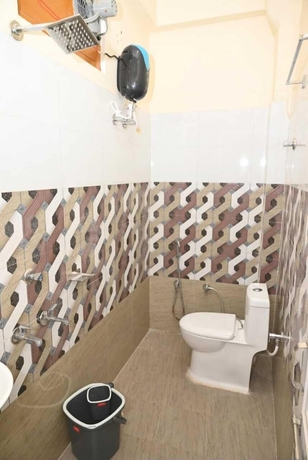 Imagen de la habitación del Hotel De Classico Residency. Foto 11