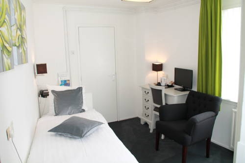 Imagen de la habitación del Hotel De Doelen. Foto 5