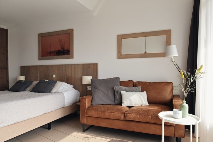 Imagen de la habitación del Hotel De Duynsuites. Foto 3