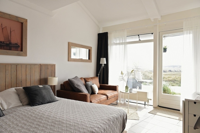 Imagen de la habitación del Hotel De Duynsuites. Foto 5