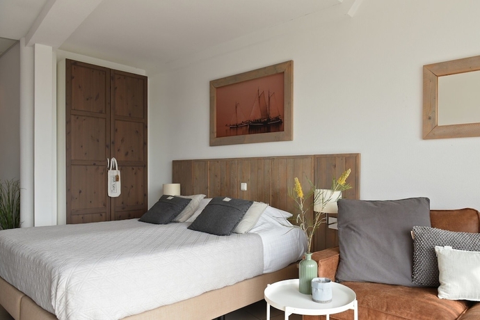 Imagen de la habitación del Hotel De Duynsuites. Foto 6