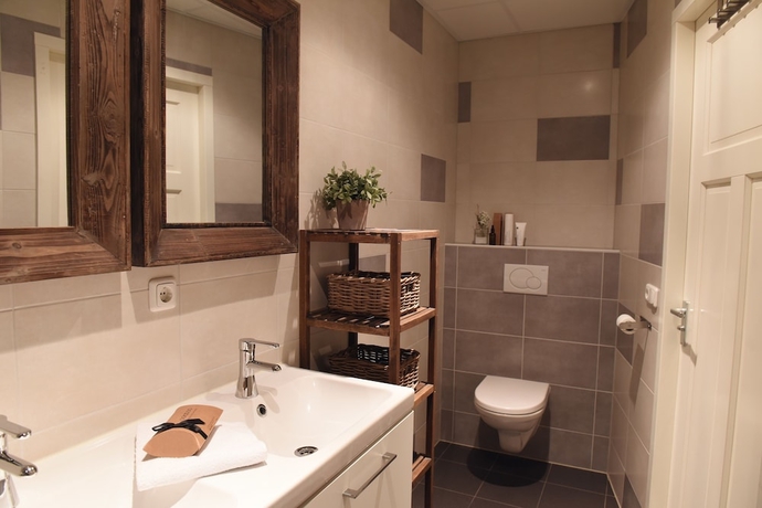 Imagen de la habitación del Hotel De Duynsuites. Foto 11