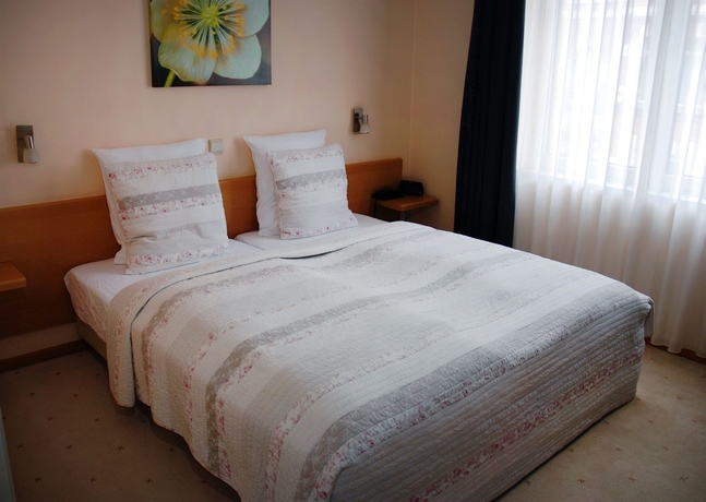 Imagen de la habitación del Hotel De Fierlant. Foto 3