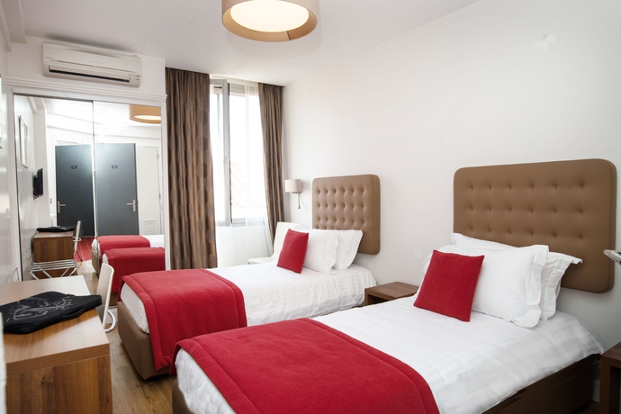 Imagen de la habitación del Hotel De France, Cannes. Foto 12