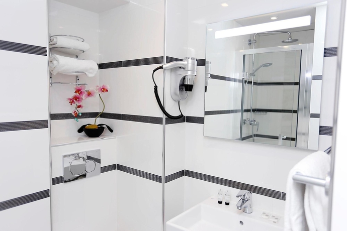 Imagen de la habitación del Hotel De France Gare de Lyon Bastille. Foto 3