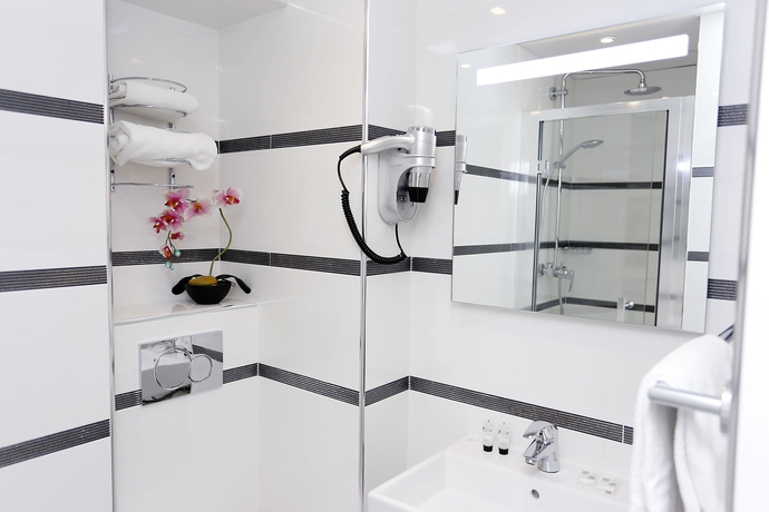 Imagen de la habitación del Hotel De France Gare de Lyon Bastille. Foto 5