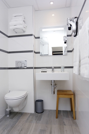 Imagen de la habitación del Hotel De France Gare de Lyon Bastille. Foto 16