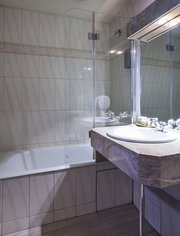 Imagen de la habitación del Hotel De France Invalides. Foto 2