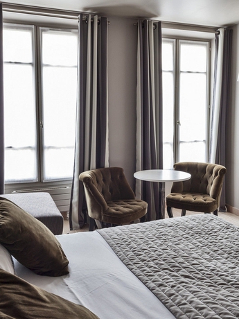 Imagen de la habitación del Hotel De France Invalides. Foto 5