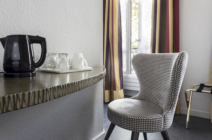 Imagen de la habitación del Hotel De France Invalides. Foto 13