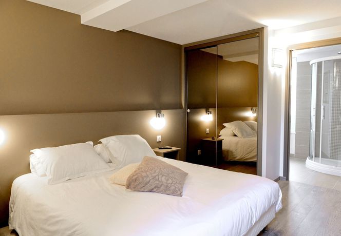 Imagen de la habitación del Hotel De France, Isigny-sur-Mer. Foto 4