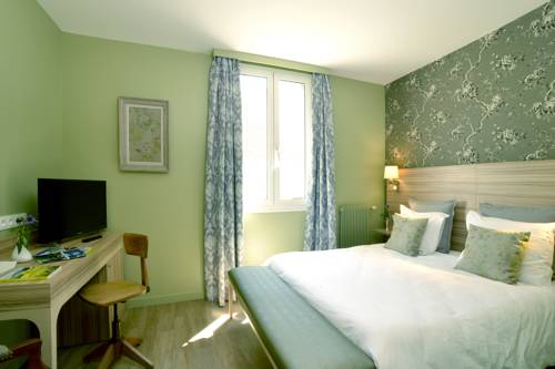 Imagen de la habitación del Hotel De France, Ornans. Foto 2