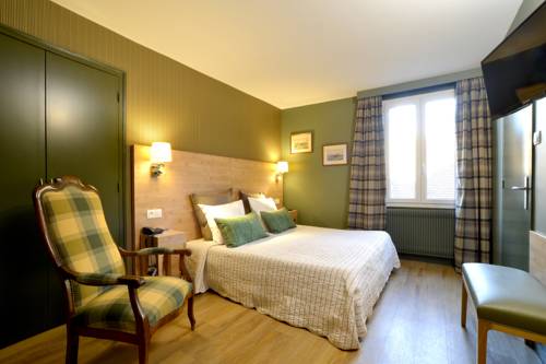 Imagen de la habitación del Hotel De France, Ornans. Foto 4
