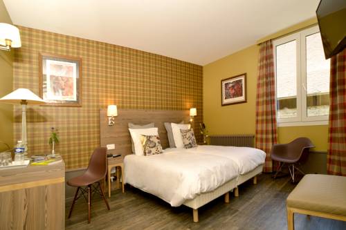 Imagen de la habitación del Hotel De France, Ornans. Foto 5