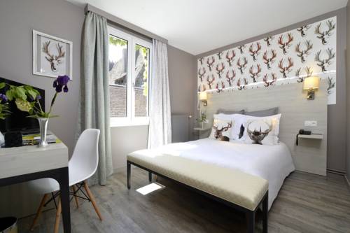 Imagen de la habitación del Hotel De France, Ornans. Foto 14