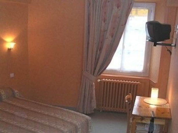 Imagen de la habitación del Hotel De France, Rochechouart. Foto 3