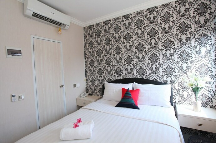 Imagen de la habitación del Hotel De Green Inn. Foto 22