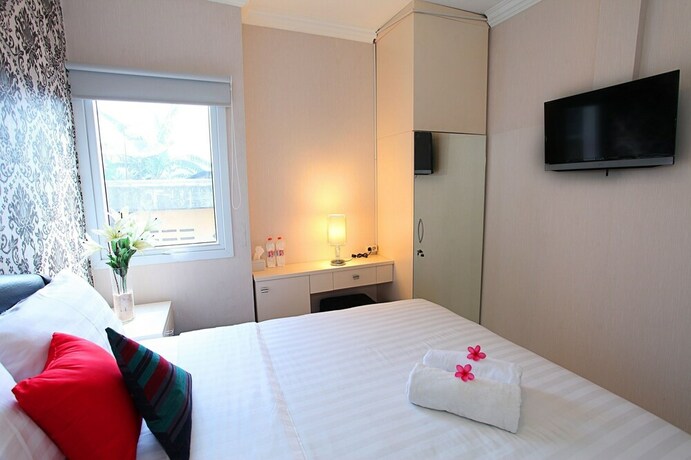 Imagen de la habitación del Hotel De Green Inn. Foto 25