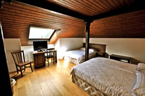 Imagen de la habitación del Hotel De Gruyères. Foto 8