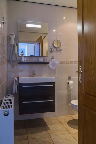 Imagen de la habitación del Hotel De Gulden Leeuw. Foto 12