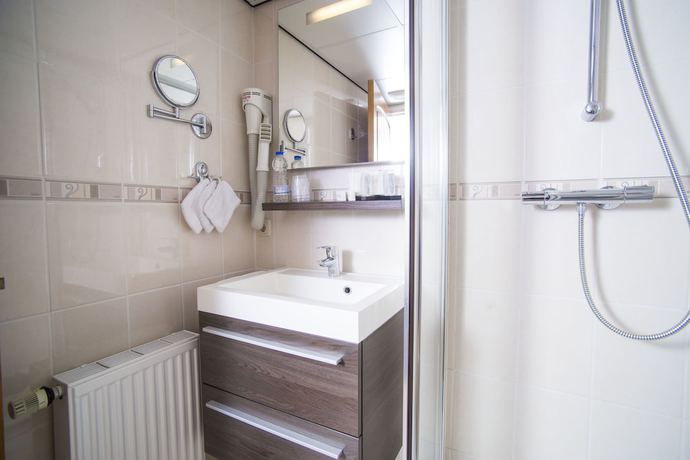 Imagen de la habitación del Hotel De Gulden Leeuw. Foto 17