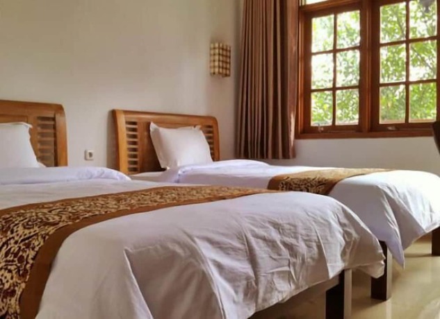 Imagen de la habitación del Hotel De Halimun Guest House. Foto 14
