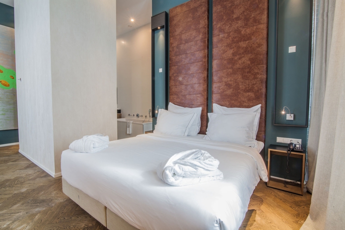 Imagen de la habitación del Hotel De Hallen. Foto 7