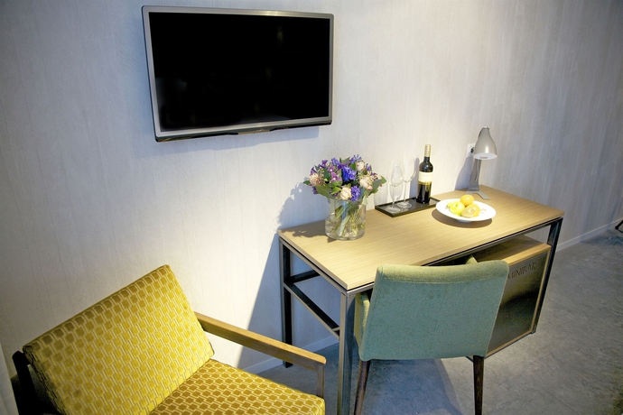 Imagen de la habitación del Hotel De Hallen. Foto 11