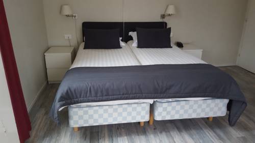 Imagen de la habitación del Hotel De Herbergier. Foto 14