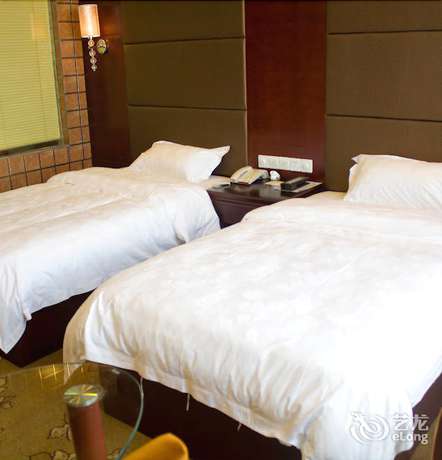 Imagen de la habitación del Hotel De Hua Tang Bed Culture Hotel. Foto 5