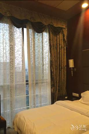 Imagen de la habitación del Hotel De Hua Tang Bed Culture Hotel. Foto 6