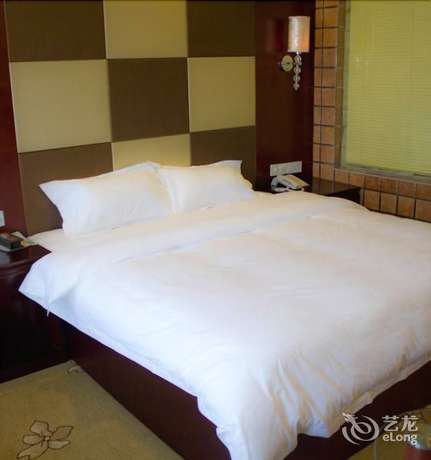 Imagen de la habitación del Hotel De Hua Tang Bed Culture Hotel. Foto 11