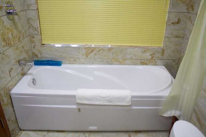 Imagen de la habitación del Hotel De Hua Tang Bed Culture Hotel. Foto 16