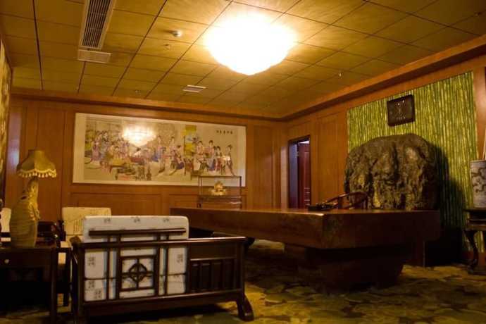 Imagen de la habitación del Hotel De Hua Tang Bed Culture Hotel. Foto 17