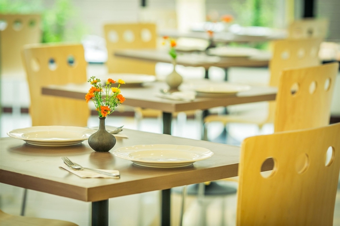 Imagen del bar/restaurante del Hotel De Hug and Residence. Foto 2