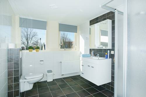 Imagen de la habitación del Hotel De Klok. Foto 2