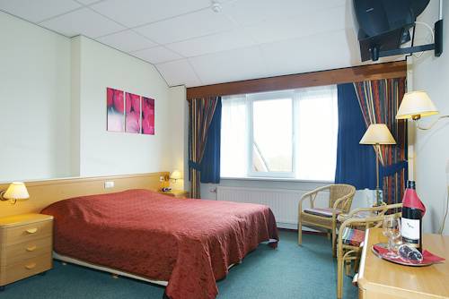 Imagen de la habitación del Hotel De Klok. Foto 7