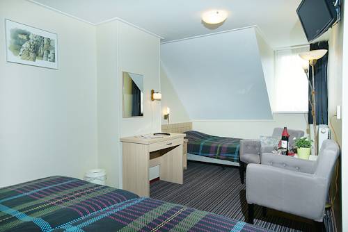 Imagen de la habitación del Hotel De Klok. Foto 9