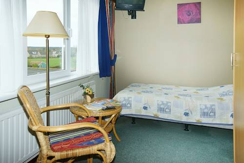 Imagen de la habitación del Hotel De Klok. Foto 10