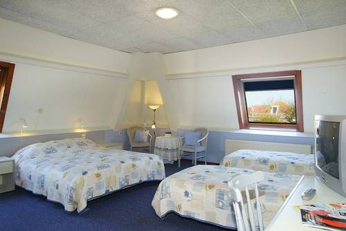 Imagen de la habitación del Hotel De Klok. Foto 12